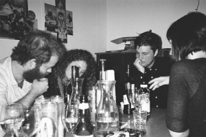 Several bottles of wine on a table.
