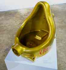 Cary Loren, found urinal, gold paint, stickers