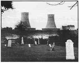 photo: Twin cooling towers at the Fermi Nuclear Facility loom over a Monroe County graveyard. photo/Steven Benson