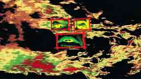 A computer-generated image shows 2 eyes above a mouth, each framed by a red rectangle, against a background of shapes which, in the videos, pulsate and move in relation to the accompanying sound .