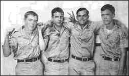 Photo of 4 young men in U.S. Army uniforms