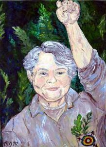 Marius Mason, smiling portrait with raised fist