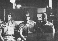 Photo shows three young men in US Army uniforms.